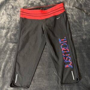 Nike women’s Black Leggings with pink and Blue Accents